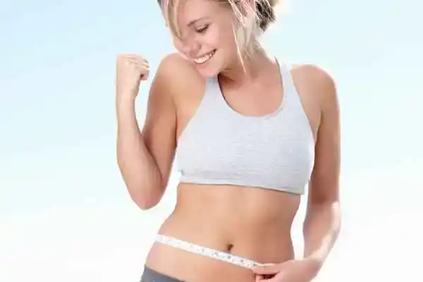Unraveling the Mystery: Where Does the Body Fat Loss From First? 3 Image of woman happy with fat loss Coalville